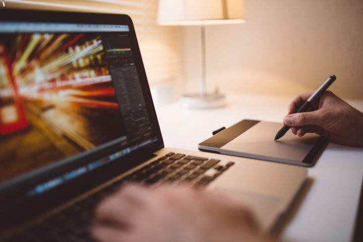 graphic designer working on a laptop