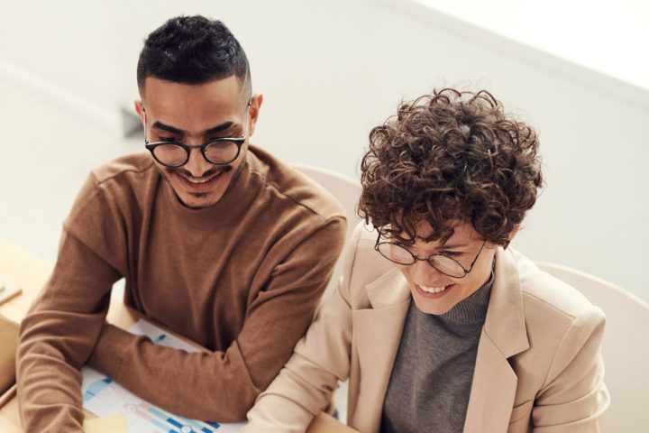 bookkeepers reviewing data in a meeting