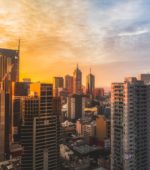 skyline of a city center at dusk