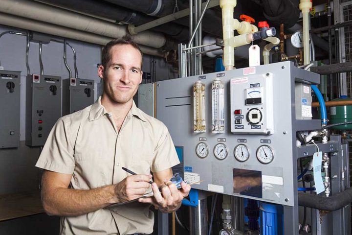 Energy Auditor checking machinery