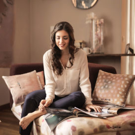 designer looking through magazines for inspiration