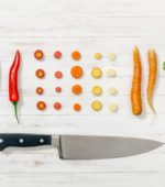 vegetables laid out next to knife