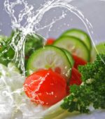 cucumber, lettuce and tomatoes are washed