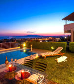 view from a luxurious resort and pool at dusk