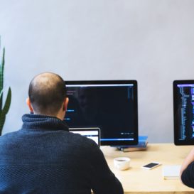 two developers coding javascript