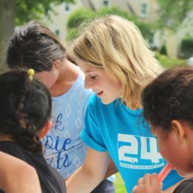 public service volunteer working with community youth
