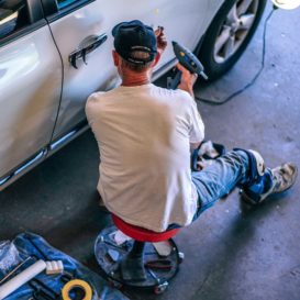 automobile body repair in a shop
