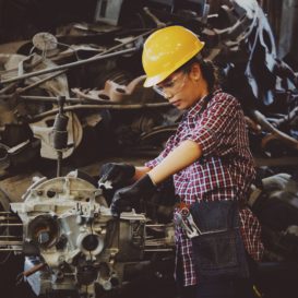specialist fixing an engine